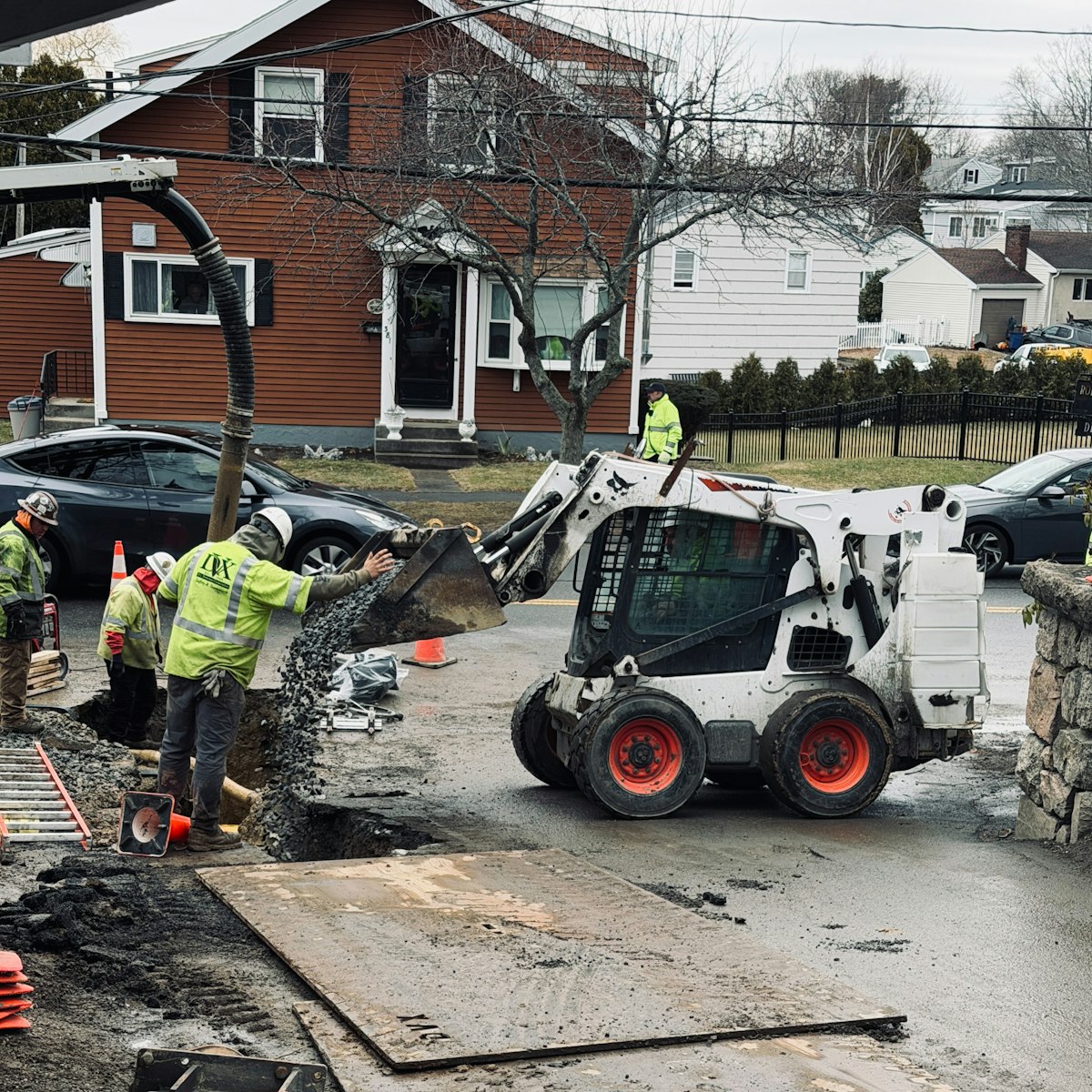 Sanford's skid steer on a residential CNY job site